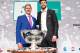 International Tennis Federation (ITF) president David Haggerty (L) and Barcelona's Spanish defender and Kosmos president Gerard Pique pose with the trophy after the draw for the 2019 Davis Cup tennis finals in Madrid on February 14, 2019. (Photo by JAVIER SORIANO / AFP) (Photo credit should read JAVIER SORIANO/AFP/Getty Images)