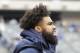 Dallas Cowboys' Ezekiel Elliott looks over the field before an NFL football game against the New York Giants, Sunday, Dec., 30, 2018, in East Rutherford, N.J. (AP Photo/Frank Franklin II)