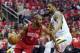 Houston Rockets guard Chris Paul (3) drives around Utah Jazz forward Derrick Favors (15) during the first half in Game 5 of an NBA basketball playoff series, in Houston, Wednesday, April 24, 2019. (AP Photo/David J. Phillip)