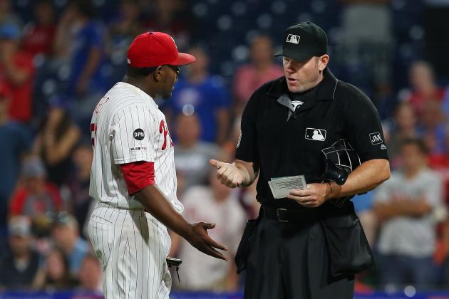 PHILADELPHIA, PA - JULY 16: Closer Hector Neris #50 of Philadelphia Phillies questions home plate umpire Chris Conroy on his ejection from the game after he hit David Freese #25 of the Los Angeles Dodgers in the head during the ninth inning of a baseball game at Citizens Bank Park on July 16, 2019 in Philadelphia, Pennsylvania. The Phillies defeated the Dodgers 9-8. (Photo by Rich Schultz/Getty Images)