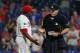 PHILADELPHIA, PA - JULY 16: Closer Hector Neris #50 of Philadelphia Phillies questions home plate umpire Chris Conroy on his ejection from the game after he hit David Freese #25 of the Los Angeles Dodgers in the head during the ninth inning of a baseball game at Citizens Bank Park on July 16, 2019 in Philadelphia, Pennsylvania. The Phillies defeated the Dodgers 9-8. (Photo by Rich Schultz/Getty Images)