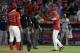 Los Angeles Angels manager Brad Ausmus right, gestures to pitcher Noe Ramirez (24) after Ramirez hit Houston Astros' Jake Marisnick with a pitch during the sixth inning of a baseball game Tuesday, July 16, 2019, in Anaheim, Calif. (AP Photo/Marcio Jose Sanchez)