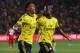 Forward Eddie Nketiah of Arsenal (R) celebrates with teammate Tyreece John-Jules (L) after scoring the winning goal against Bayern Munich during their International Champions Cup football match at the Dignity Health Stadium in Carson, California on July 17, 2019. (Photo by Mark RALSTON / AFP) (Photo credit should read MARK RALSTON/AFP/Getty Images)