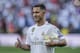 Belgium forward Eden Hazard poses for the media during his official presentation after signing for Real Madrid at the Santiago Bernabeu stadium in Madrid, Spain, Thursday, June 13, 2019. Real Madrid announced last week that it had acquired the 28-year-old Belgian playmaker from Chelsea for a reported fee of around 100 million euros ($113 million) plus variables, making him the club's most expensive signing ever. (AP Photo/Manu Fernandez)
