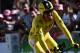 France's Julian Alaphilippe, wearing the overall leader's yellow jersey reacts as he crosses the finish line of the thirteenth stage of the 106th edition of the Tour de France cycling race, a 27,2-kilometer individual time-trial in Pau, on July 19, 2019. (Photo by JEFF PACHOUD / AFP) (Photo credit should read JEFF PACHOUD/AFP/Getty Images)