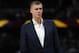 FILE - In this March 14, 2019, file photo, Dallas Mavericks forward Kristaps Porzingis stands during the second half of the team's NBA basketball game against the Denver Nuggets in Denver. An attorney for Porzingis acknowledges that a woman has accused the NBA star of rape, but “unequivocally” denies the allegation. Lawyer Roland Riopelle said Saturday, March 30, that the claim against the Dallas Maverick was part of an extortion attempt that is being investigated by the FBI. (AP Photo/David Zalubowski, File)