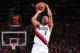 PORTLAND, OR - MAY 20: CJ McCollum #3 of the Portland Trail Blazers shoots the ball against the Golden State Warriors during Game Four of the Western Conference Finals on May 20, 2019 at the Moda Center in Portland, Oregon. NOTE TO USER: User expressly acknowledges and agrees that, by downloading and/or using this photograph, user is consenting to the terms and conditions of the Getty Images License Agreement. Mandatory Copyright Notice: Copyright 2019 NBAE (Photo by Sam Forencich/NBAE via Getty Images)