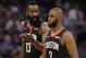 Houston Rockets guard James Harden, left, talks with teammate Chris Paul as they walk off the court during a timeout in the second half of an NBA basketball game against the Sacramento Kings, Tuesday, April 2, 2019, in Sacramento, Calif. The Rockets won 130-105. (AP Photo/Rich Pedroncelli)