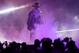 TOPSHOT - World Wrestling Entertainment star The Undertaker makes his way to the ring during a match at the World Wrestling Entertainment (WWE) Super Showdown event in the Saudi Red Sea port city of Jeddah late on January 7, 2019. (Photo by Amer HILABI / AFP) (Photo credit should read AMER HILABI/AFP/Getty Images)