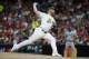 American League pitcher Liam Hendriks, of the Oakland Athletics, throws during the sixth inning of the MLB baseball All-Star Game against the National League, Tuesday, July 9, 2019, in Cleveland. (AP Photo/John Minchillo)