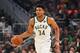 Milwaukee Bucks' Giannis Antetokounmpo dribbles during the first half of Game 5 of the NBA Eastern Conference basketball playoff finals against the Toronto Raptors Thursday, May 23, 2019, in Milwaukee. (AP Photo/Morry Gash)