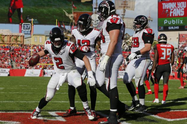 Atlanta Falcons quarterback Matt Ryan (2) celebrates after catching a 5-yard touchdown pass from Mohamed Sanu during the second half of an NFL football game against the Tampa Bay Buccaneers Sunday, Dec. 30, 2018, in Tampa, Fla. (AP Photo/Mark LoMoglio)