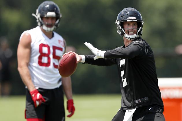 Atlanta Falcons quarterback Matt Ryan (2) throws a pass as tight end Eric Saubert (85) looks on during their NFL minicamp football practice Tuesday, June 11, 2019, in Flowery Branch, Ga. (AP Photo/John Bazemore)
