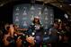 CHANDLER, AZ - JANUARY 28: Running back Marshawn Lynch #24 of the Seattle Seahawks sits at his podium during a Super Bowl XLIX media availability at the Arizona Grand Hotel on January 28, 2015 in Chandler, Arizona. (Photo by Christian Petersen/Getty Images)