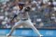 Toronto Blue Jays starting pitcher Marcus Stroman winds up during the first inning of a baseball game against the New York Yankees, Sunday, July 14, 2019, in New York. (AP Photo/Kathy Willens)