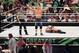 John Cena (C) celebrates defeating Triple H (R) during the World Wrestling Entertainment (WWE) Greatest Royal Rumble event in the Saudi coastal city of Jeddah on April 27, 2018. (Photo by STRINGER / AFP) (Photo credit should read STRINGER/AFP/Getty Images)