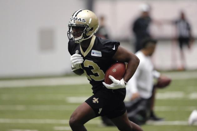 New Orleans Saints wide receiver Michael Thomas (13) runs a drill at their NFL football training facility in Metairie, La., Tuesday, June 11, 2019. (AP Photo/Gerald Herbert)