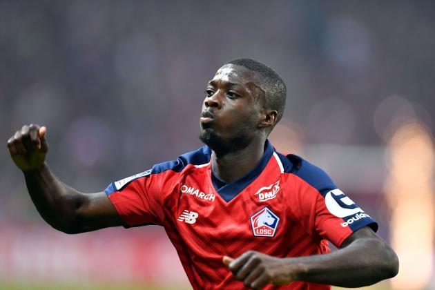 Lille's Ivorian forward Nicolas Pepe celebrates after scoring a goal during the French L1 football match between Lille (LOSC) and Angers (SCO) at the Pierre-Mauroy Stadium in Villeneuve d'Ascq, near Lille, northern France, on May 18 2019. (Photo by DENIS CHARLET / AFP) (Photo credit should read DENIS CHARLET/AFP/Getty Images)