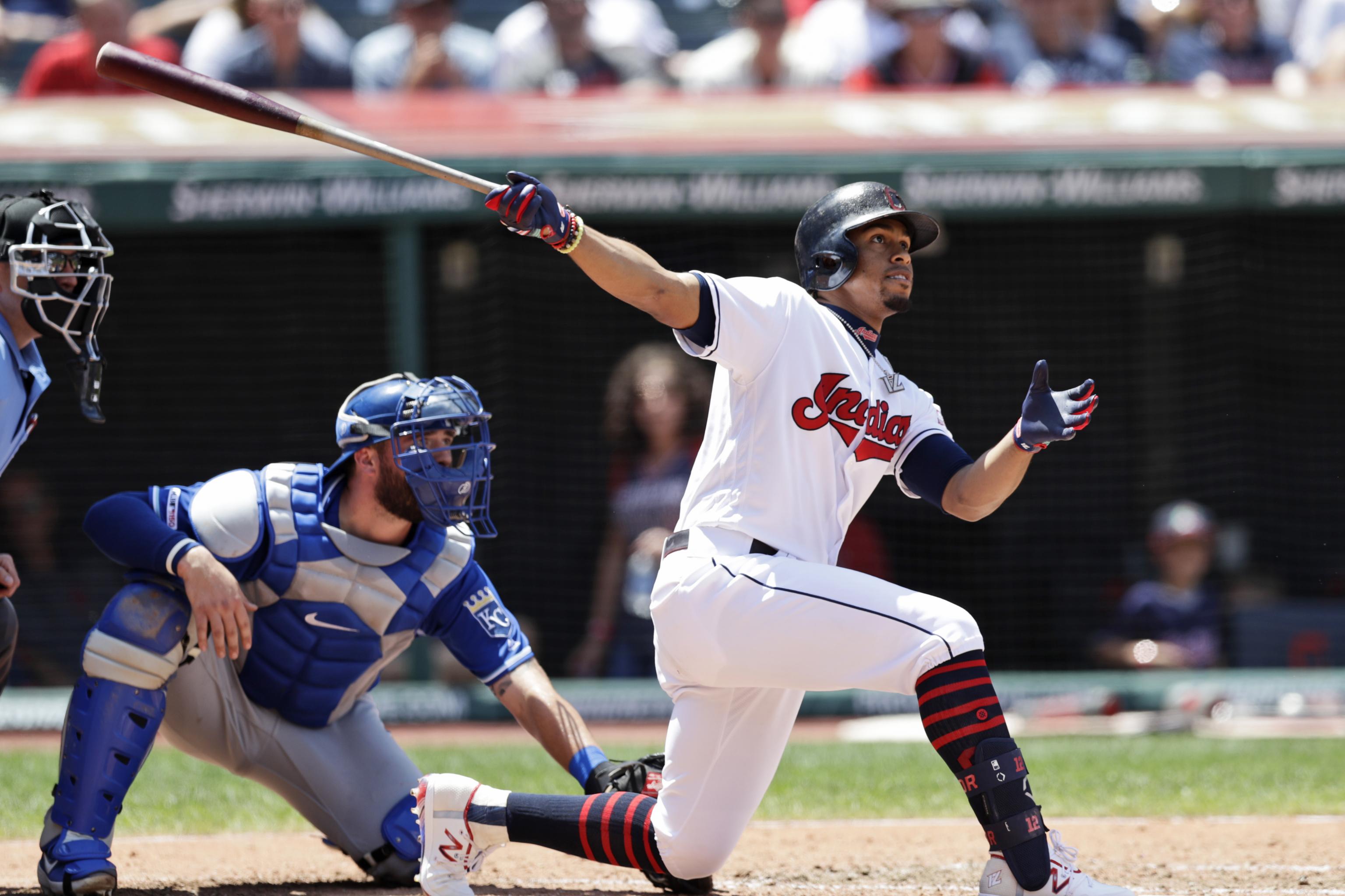 Cleveland Indians Francisco Lindor throws to first during fielding drills  at spring training in Goodyear, Arizona. Feb. 21,…