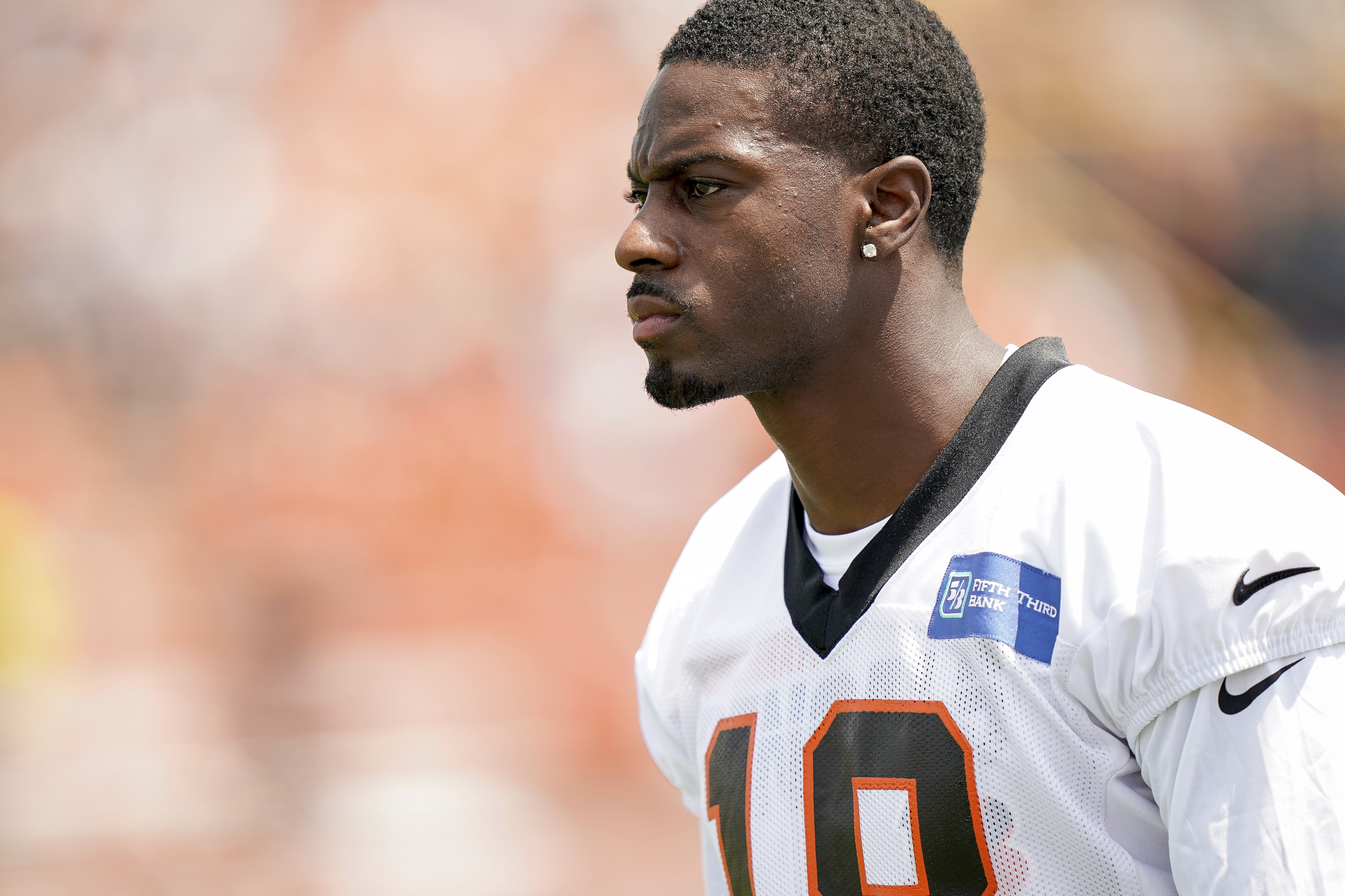 Cincinnati Bengals' wide receiver A. J. Green, 18, who is recovering from  an injury, attends an NFL practice session at the Allianz Park stadium in  north London, Friday, Oct. 25, 2019. The