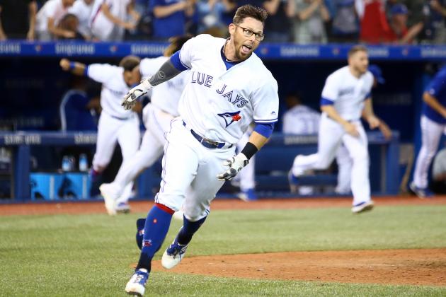 TORONTO, ON - JULY 23:  Eric Sogard #5 of the Toronto Blue Jays celebrates after scoring the game winning run on a single by Justin Smoak #14 in the tenth inning during a MLB game against the Cleveland Indians at Rogers Centre on July 23, 2019 in Toronto, Canada.  (Photo by Vaughn Ridley/Getty Images)