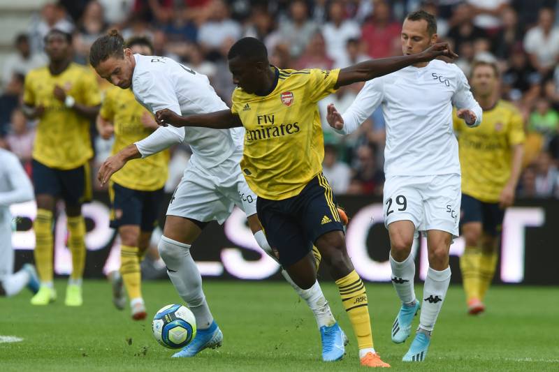 Arsenal's English striker Eddie Nketiah (C) vies with Angers' French defender Mateo Pavlovic (L) and Angers' French defender Vincent Manceau (R) during the international friendly football match between Angers SCO and Arsenal FC, at the Raymond-Kopa Stadium, in Angers, northwestern France, on July 31, 2019. (Photo by JEAN-FRANCOIS MONIER / AFP) (Photo credit should read JEAN-FRANCOIS MONIER/AFP/Getty Images)