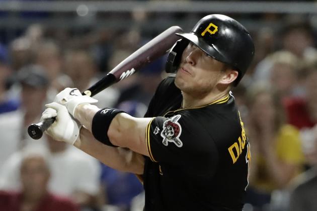 Pittsburgh Pirates' Corey Dickerson watches his game-winning sacrifice fly to left field off Chicago Cubs relief pitcher Craig Kimbrel during the ninth inning of a baseball game in Pittsburgh, Wednesday, July 3, 2019. The Pirates won 6-5. (AP Photo/Gene J. Puskar)