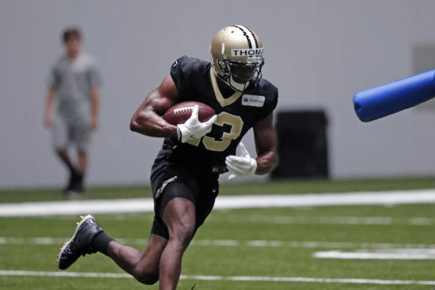 New Orleans Saints wide receiver Michael Thomas (13) runs through drills during training camp at their NFL football training facility in Metairie, La., Thursday, Aug. 1, 2019. (AP Photo/Gerald Herbert)