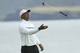 Tiger Woods of the United States throws his club in the air con the 5th green during the second round of the British Open Golf Championships at Royal Portrush in Northern Ireland, Friday, July 19, 2019.(AP Photo/Peter Morrison)