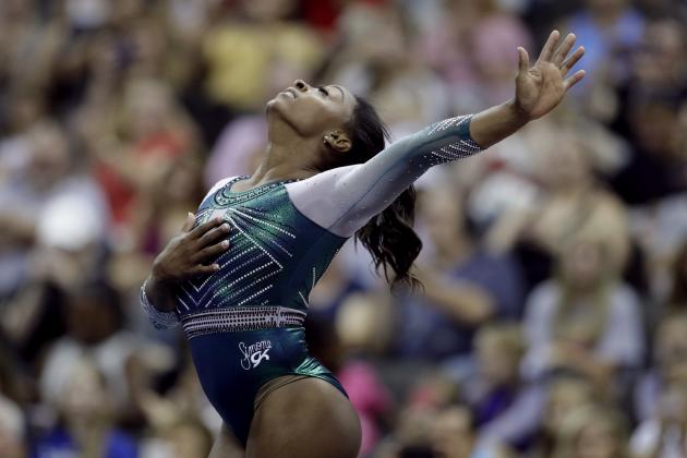 Simone Biles competes on the floor exercise at the U.S. Gymnastics Championships on Friday, Aug. 9, 2019, in Kansas City, Mo. (AP Photo/Charlie Riedel)