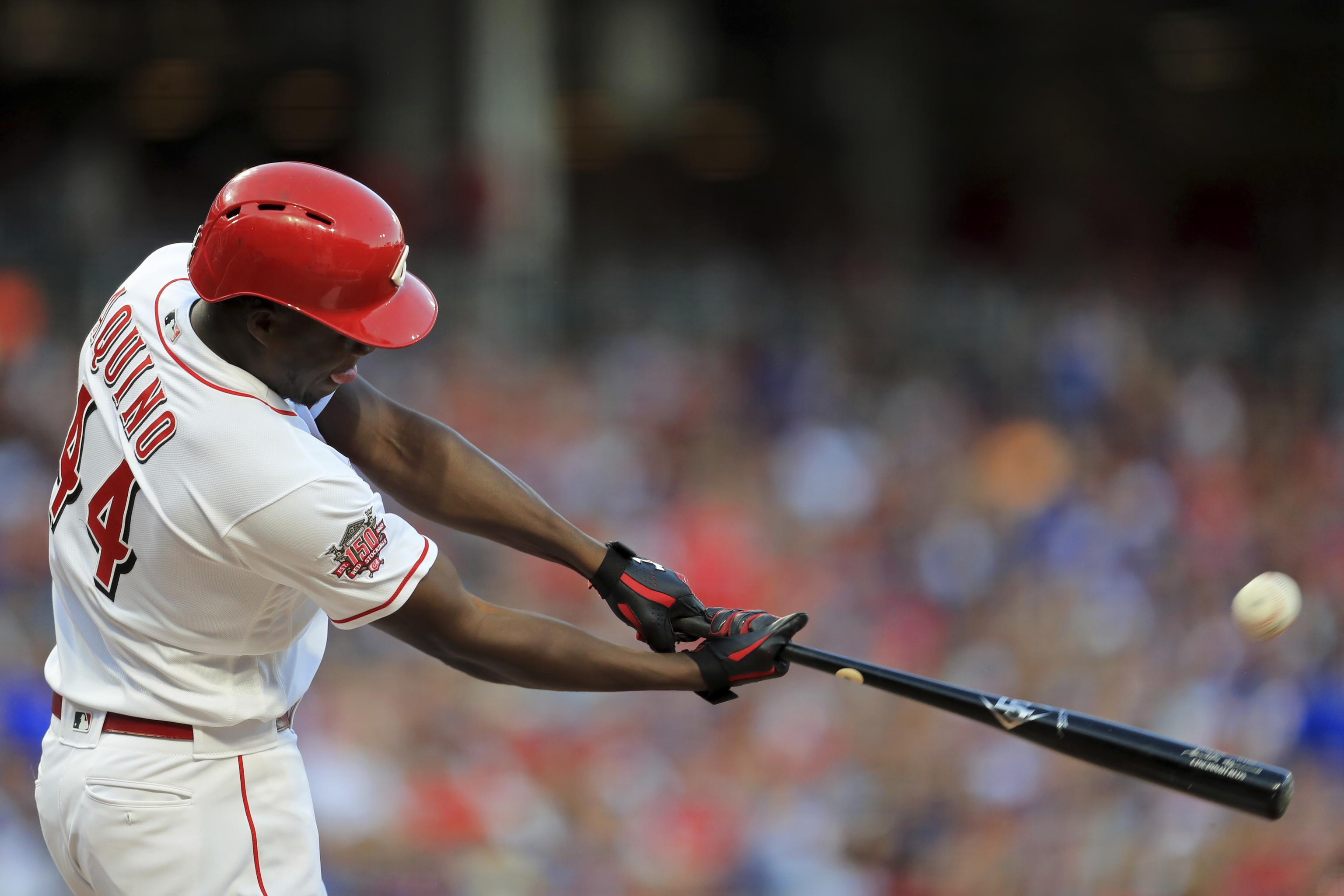 Aristides Aquino homers three times to lift Reds to a win over Cubs