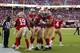 San Francisco 49ers wide receiver Jalen Hurd, center, celebrates with teammates after scoring against the Dallas Cowboys during the first half of an NFL preseason football game in Santa Clara, Calif., Saturday, Aug. 10, 2019. (AP Photo/John Hefti)
