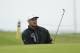 Bryson DeChambeau of the United States chips onto the 15th green during a practice round ahead of the start of the British Open golf championships at Royal Portrush in Northern Ireland, Wednesday, July 17, 2019. The British Open starts Thursday. (AP Photo/Matt Dunham)