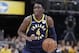 Indiana Pacers guard Victor Oladipo (4) plays against the Charlotte Hornets during the second half of an NBA basketball game in Indianapolis, Sunday, Jan. 20, 2019. The Pacers defeated the Hornets 120-95.(AP Photo/Michael Conroy)