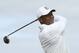 Tiger Woods of the United States plays his tee shot on the 2nd hole during the second round of the British Open Golf Championships at Royal Portrush in Northern Ireland, Friday, July 19, 2019.(AP Photo/Peter Morrison)