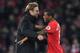 Liverpool's German manager Jurgen Klopp (L) celebrates on the pitch with goalscorer Liverpool's Dutch midfielder Georginio Wijnaldum after the English Premier League football match between Liverpool and Manchester City at Anfield in Liverpool, north west England on December 31, 2016.
Liverpool won the game 1-0. / AFP / Paul ELLIS / RESTRICTED TO EDITORIAL USE. No use with unauthorized audio, video, data, fixture lists, club/league logos or 'live' services. Online in-match use limited to 75 images, no video emulation. No use in betting, games or single club/league/player publications. / (Photo credit should read PAUL ELLIS/AFP/Getty Images)