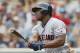 Cleveland Indians' Yasiel Puig bats against the Minnesota Twins in a baseball game Sunday, Aug. 11, 2019, in Minneapolis. (AP Photo/Jim Mone)