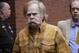 Harvey Updyke departs the Lee County Justice Center in Opelika, Ala., Monday, June 10, 2013. Updyke pleaded guilty in March to one count of unlawful damage of an animal or crop facility. He was sentenced to 6 months in jail and credited with 104 days for time already served. The oaks were removed in April. Under his probation, Updyke is forbidden from attending any collegiate sports event, will have a 7 p.m. curfew and is banned from Auburn University. (AP Photo/Dave Martin)