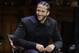 FILE - In this Oct. 11, 2018, file photo, former NFL football quarterback Colin Kaepernick smikes on stage during W.E.B. Du Bois Medal ceremonies at Harvard University, in Cambridge, Mass. Colin Kaepernick wants to play in the NFL, even if he has to compete to get on the field. A source close to Kaepernick told The Associated Press on Friday: “Colin has always been prepared to compete at the highest level and is in the best shape of his life.” Kaepernick released a video earlier this week saying: “5 a.m. 5 days a week. For 3 years. Still Ready.” (AP Photo/Steven Senne, File)