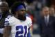 Dallas Cowboys running back Ezekiel Elliott (21) walks onto the field during warm ups before an NFL football game against the Tampa Bay Buccaneers in Arlington, Texas, Sunday, Dec. 23, 2018. (AP Photo/Ron Jenkins)