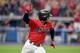 CLEVELAND, OHIO - AUGUST 13: Francisco Lindor #12 of the Cleveland Indians celebrates as he runs out an RBI double to tie the game during the ninth inning against the Boston Red Sox at Progressive Field on August 13, 2019 in Cleveland, Ohio. (Photo by Jason Miller/Getty Images)