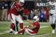 Arizona Cardinals quarterback Kyler Murray (1) is helped up by offensive tackle Marcus Gilbert (76) after being sacked for a safety against the Oakland Raiders during the first half of an an NFL football game, Thursday, Aug. 15, 2019, in Glendale, Ariz. (AP Photo/Rick Scuteri)