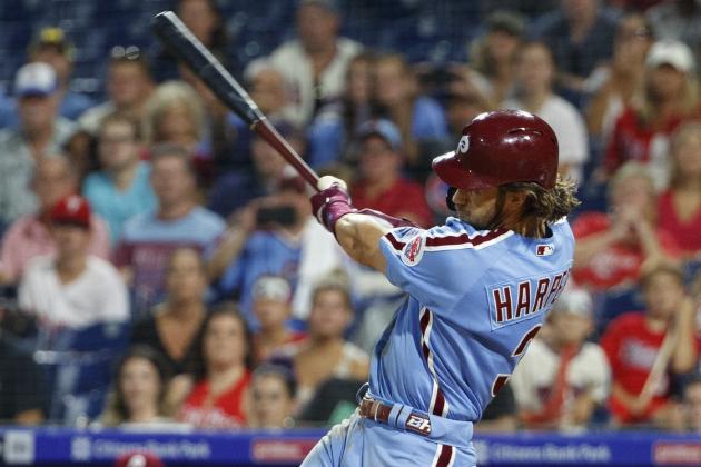 Philadelphia Phillies' Bryce Harper hits a grand slam during the ninth inning of the team's baseball game against the Chicago Cubs, Thursday, Aug. 15, 2019, in Philadelphia. Phillies won 7-5. (AP Photo/Chris Szagola)