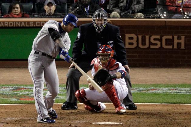 ST LOUIS, MO - OCTOBER 27: Josh Hamilton #32 of the Texas Rangers hits a two-run home run in the 10th inning off of Jason Motte #30 of the St. Louis Cardinals during Game Six of the MLB World Series at Busch Stadium on October 27, 2011 in St Louis, Missouri.  (Photo by Rob Carr/Getty Images)