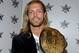 Wrestler Edge attends the 25th Anniversary of WrestleMania press conference at the Hard Rock Cafe, Tuesday, March 31, 2009, in New York. (AP Photo/Charles Sykes)