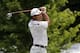 Hideki Matsuyama, of Japan, watches his tee shot on the fifth hole during the second round of the BMW Championship golf tournament at Medinah Country Club, Friday, Aug. 16, 2019, in Medinah, Ill. (AP Photo/Nam Y. Huh)