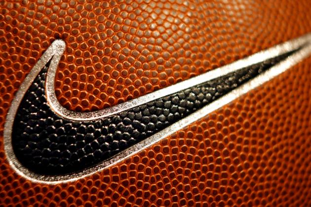 A Nike Swoosh is seen on a basketball at Niketown in Portland, Ore., Tuesday, March 21, 2006. Nike Inc. is expected to release third-quarter earnings after the close of trading. (AP Photo/Rick Bowmer)
