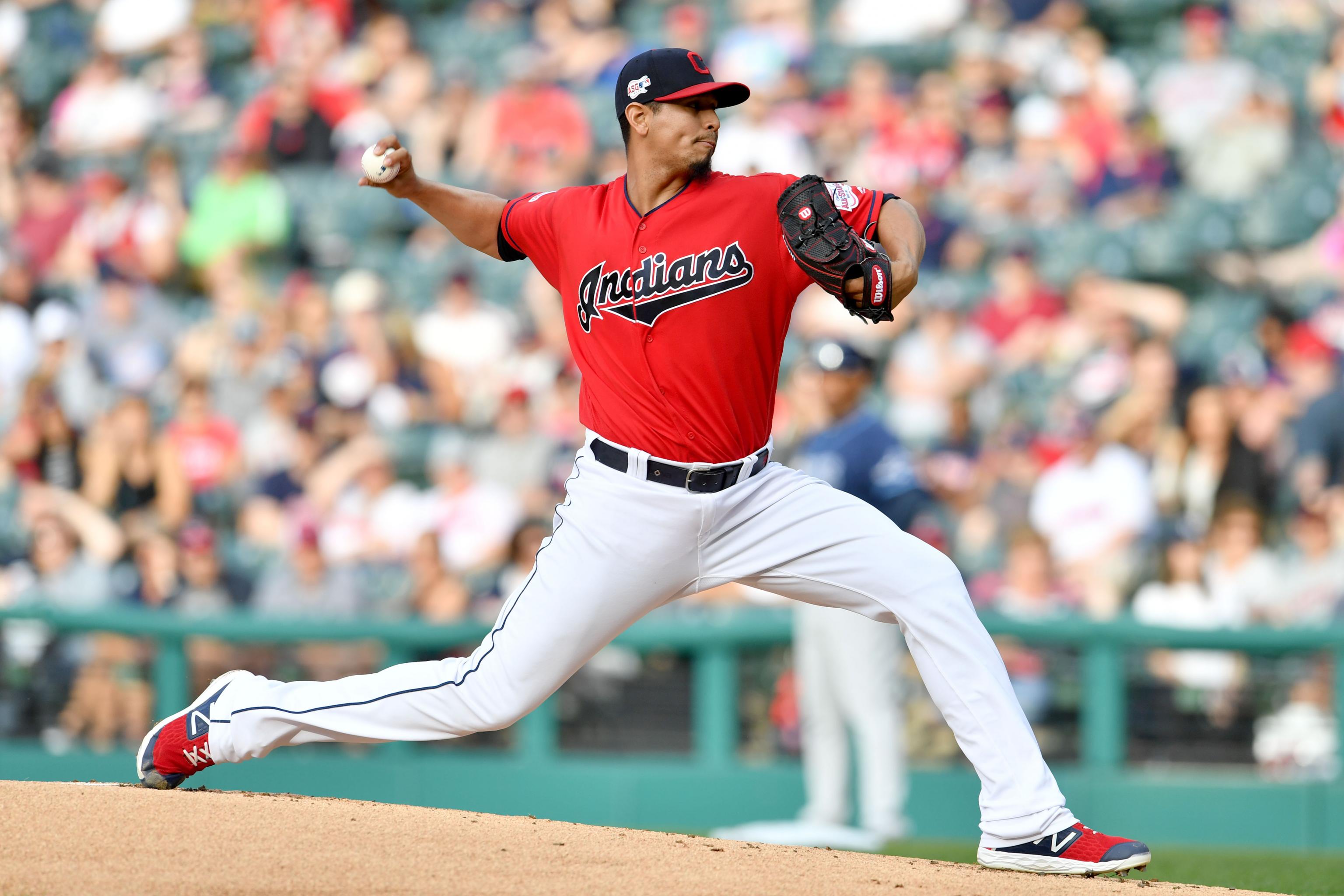 Cleveland Indians pitcher Carlos Carrasco throws live batting