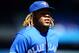 TORONTO, ON - AUGUST 14: Vladimir Guerrero Jr. #27 of the Toronto Blue Jays runs to the dugout in the first inning during a MLB game against the Texas Rangers at Rogers Centre on August 14, 2019 in Toronto, Canada. (Photo by Vaughn Ridley/Getty Images)