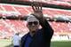 Dallas Cowboys owner Jerry Jones waves before an NFL preseason football game between the San Francisco 49ers and the Cowboys in Santa Clara, Calif., Saturday, Aug. 10, 2019. (AP Photo/Josie Lepe)